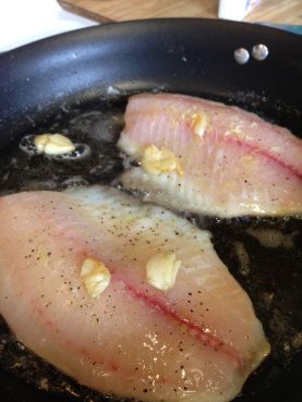 Garlic Lemon Tilapia is super easy and inexpensive! When youre sick of eating chicken, tilapia is a healthy alternative. I always have garlic and lemons in the house; this recipe puts them to