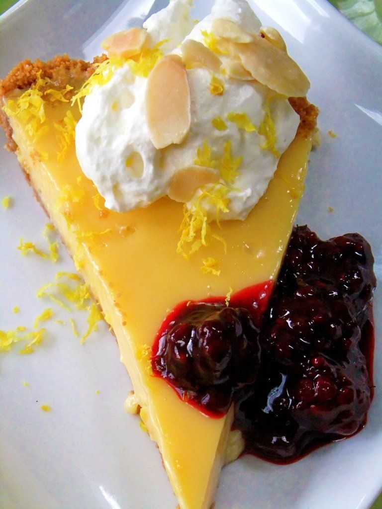 Limoncello Tart with Amaretti Cookie Crust and Blueberry Blackberry Sauce (From Proud Italian Cook blog):  I fell in love with Limoncello when we were staying at the Amalfi Coast in Italy.  I bought a