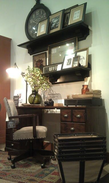 Love the use of a sweet gallary wall above this printers cabinet styled