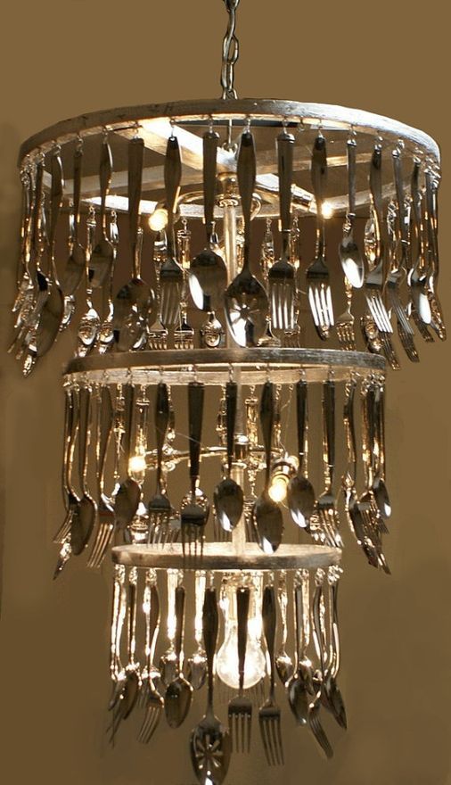 Now you could buy an old chandelier that has the crystals on it and replace them with cutlery…great