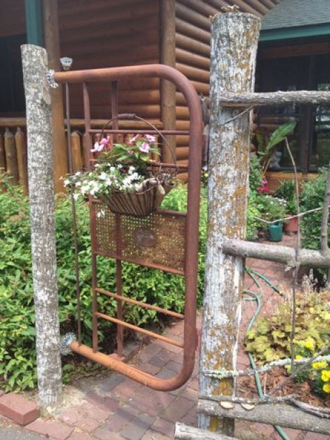 Old Metal Headboard…re-purposed into a rustic garden