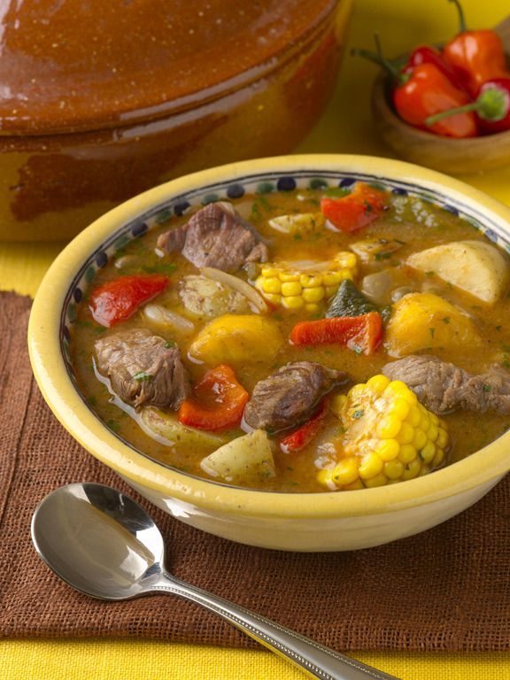 Puerto Rican Sancocho Soup, hearty and delicious with a side bowl of White Rice. Thats how us Puerto Ricans