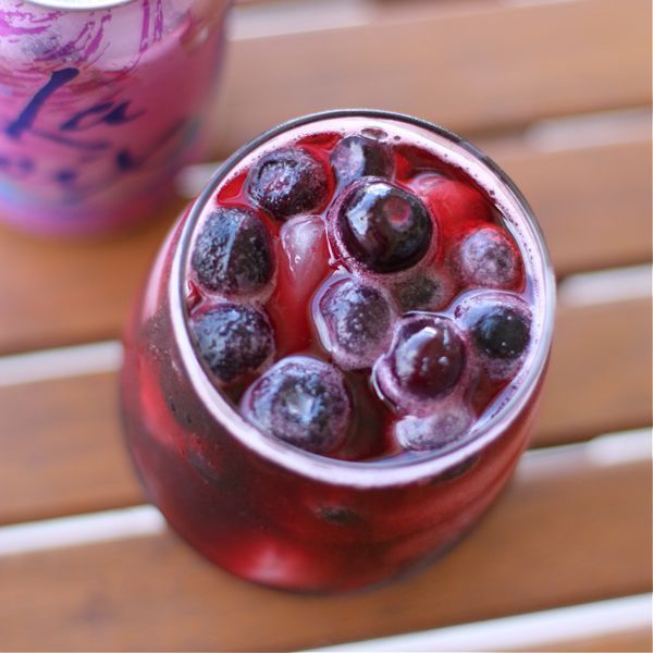 Red Wine Berry Spritzer   1 part red wine (I wouldnt use your best red wine for a drink like this)   3 parts La Croix Mixed Berry Sparkling Water   Ice   Frozen Blueberries or