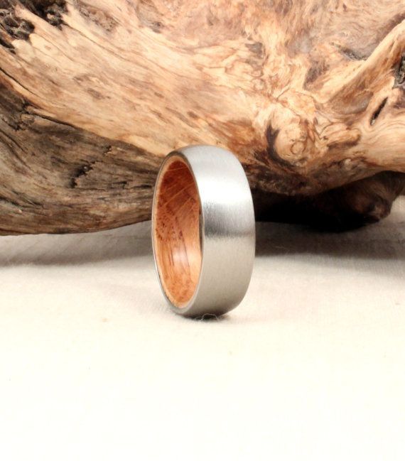 Titanium and Jack Daniels Whiskey Barrel White Oak Wedding Band, $260.. We have already picked his band out..but this is AMAZING, and whos to say guys cant have two rings?