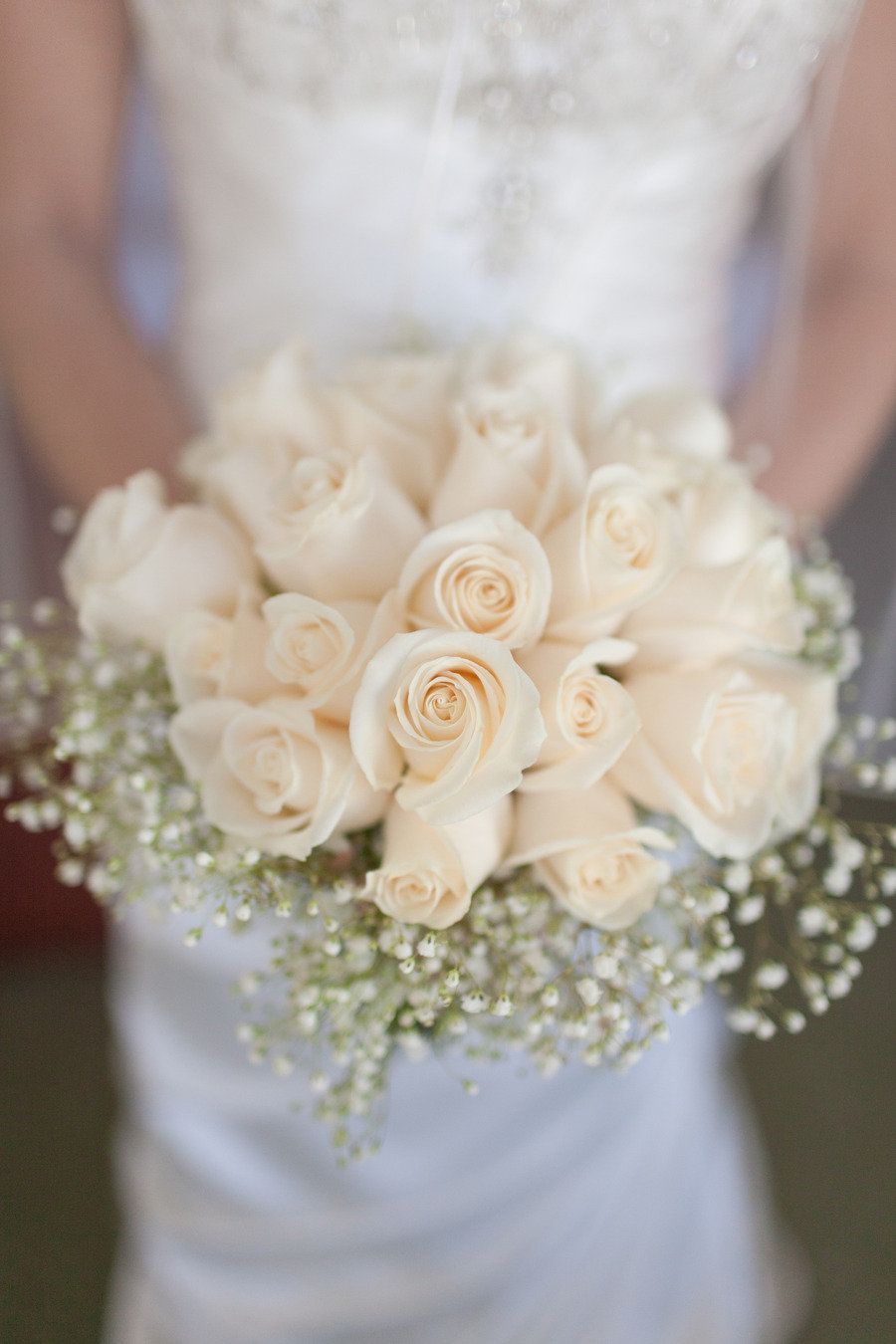 White roses and babys breath bouquet.  Photo:  Bob Care
