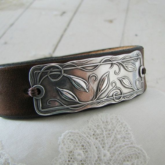 Wonderful leather cuff with metal clay