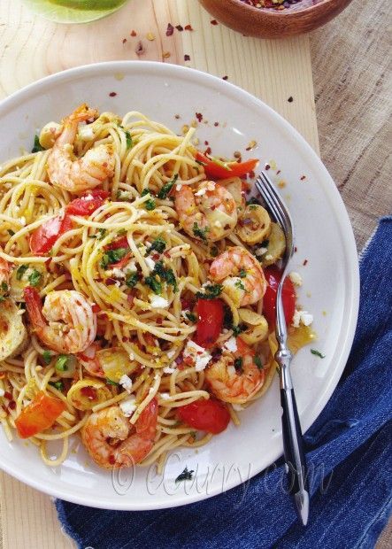 A lot of olive oil, feta and artichokes and you have the most flavorful meal ever. Pasta with Shrimp, Artichokes &