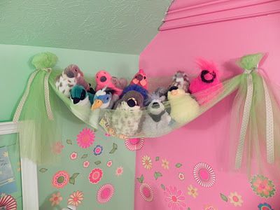 After searching for a net for Rylees millions of stuffed animals I decided it might be cuter to use tulle. Im glad I found a picture so now I know for sure it will be cute and EASY!! =