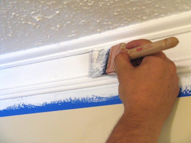 Alternative to crown molding:  quarter-round molding and thin chair rail molding with four inches of white paint on the wall in between.