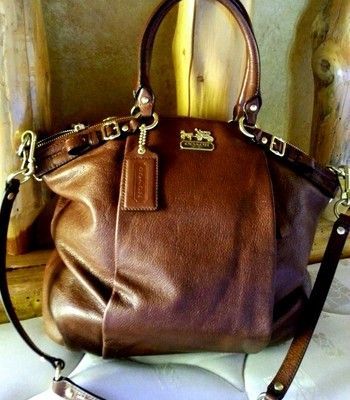 Score A Chance To Win This Coach Bag!