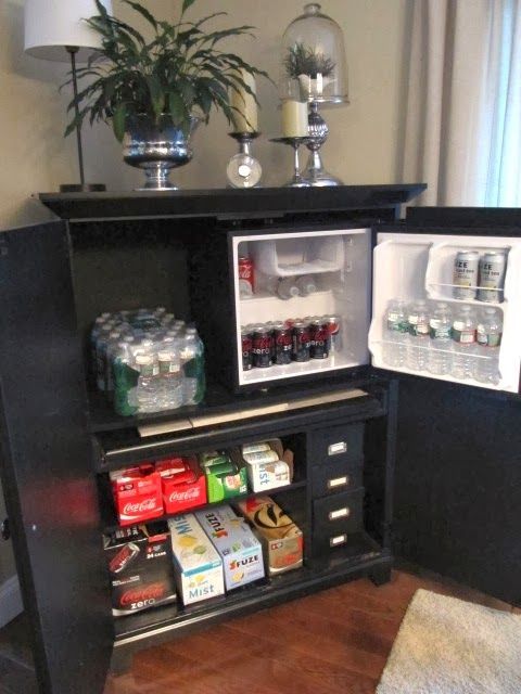 computer desk turned beverage cabinet – perfect in the basement. Maybe find a spot for a small microwave. Perfect for kids and their