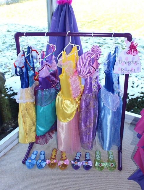 Create a disney princess dressing room at your childs birthday party so all her royal guests can play dress up. Perfect activity idea for princess themed birthday
