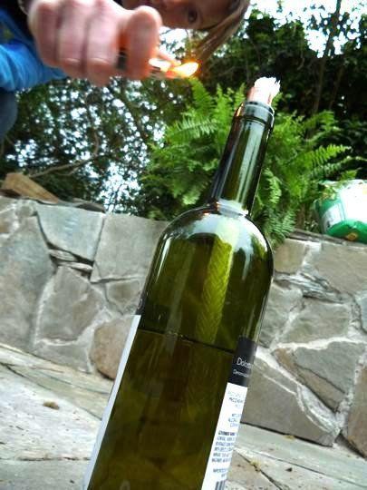 DIY tiki torch wine bottles