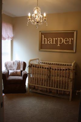 Framed name above crib make it out of cork board and use it..forever. to hang stuff on