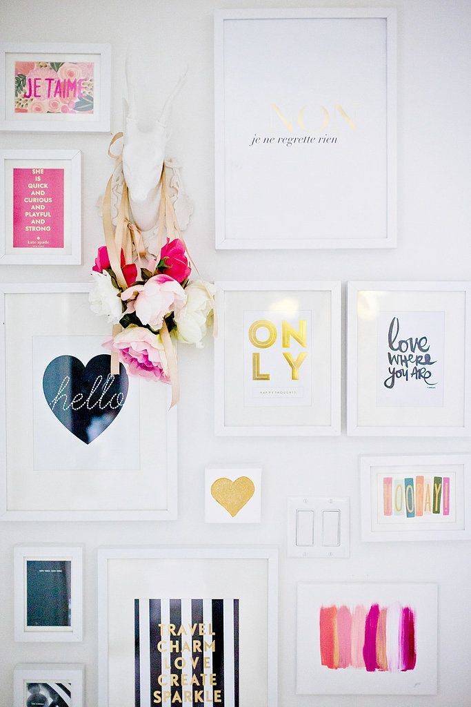 Hanging art by yourself is hard. Ask a friend to help.  NE Photo by Jamie Lauren Photography via Style Me