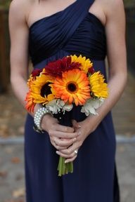 I think I might prefer this color for the bridesmaid dresses and I actually really the sunflowers for a