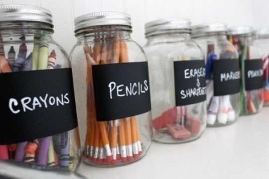 I’ve seen this for kitchen canisters, but it never occurred to me to do this for school supplies.  cute!  Would have to find some plastic jars or something, though.  Not sure about glass in the