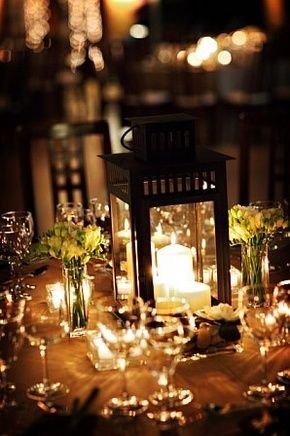 Lantern Wedding Centerpieces. love this idea. you can get those exact lanterns at Ikea for cheap! :)  can put lavender sprigs around lantern like in the