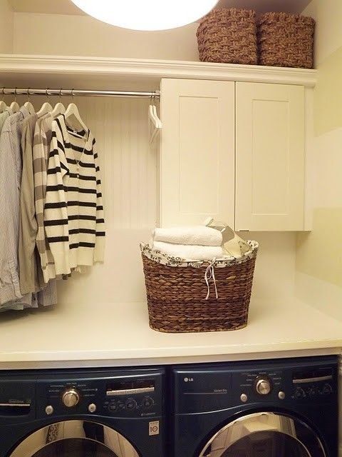 love the shelf directly on top of the washer/dryer so things cant fall behind it.  Also love the doors hiding the hanging
