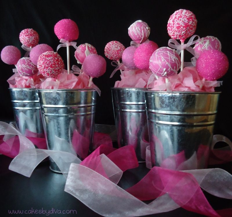 pink cake pops in tin buckets. cute for a baby shower. do blue for a little