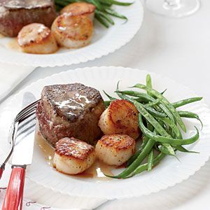 Steak and Scallops with Champagne-Butter Sauce from Coastal Living Feb. 13 issue.  They suggest serving with steamed green beans and premium vanilla icecream drizzle with hazelnut-flavored