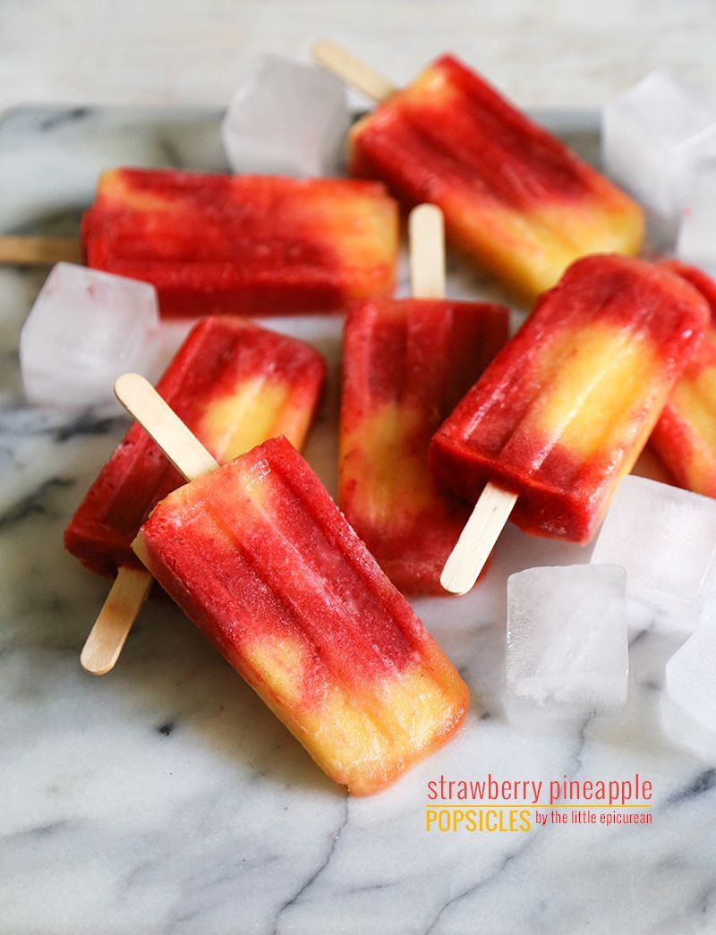 Strawberry Pineapple Popsicles – 2 c. pineapple chunks, 3 c. strawberries, 1/3 c. + 1/2 c. pineapple juice, 3 T. simple syrup (1 c. water, 1 c. sugar boiled together). Pineapple part gets 1/3 c. juice