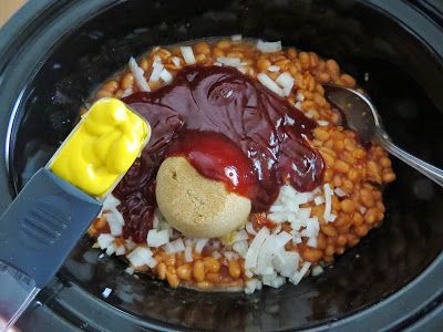 The Country Cook: Crock Pot Baked Beans  Recipe can be adjusted to suit your taste.  Also, you can cook bacon, then saut onion in a little of the bacon grease before