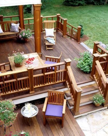 This is the kind of deck I want, partially covered and partially in the sun, a 2nd level maybe with a fire pit or a hot