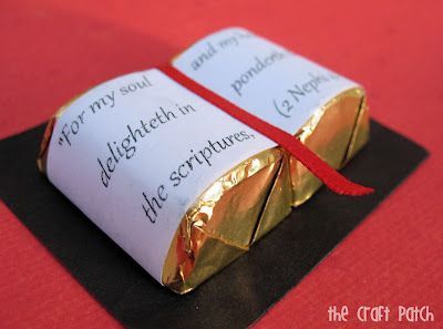 Two little Hersheys Chocolates attached to a black piece of paper…print verse out and attach to wrappers to look like the Bible! Add a piece of red ribbon for the bookmark! Such a cute
