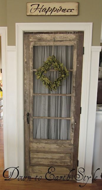 use an old exterior door for a pantry door…this website has tons of rustic chic home design