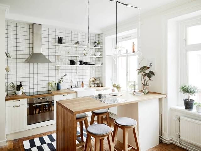 A serene Swedish home in white and wood