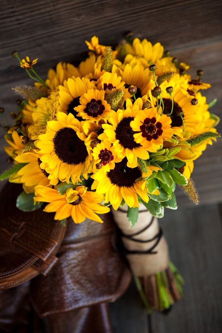 Beautiful sunflower wedding bouquet…if I were having a summer