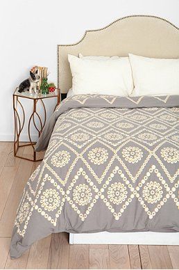 Check out Urban Outfitters bedding selection.  Home accessories are a necessity for your new
