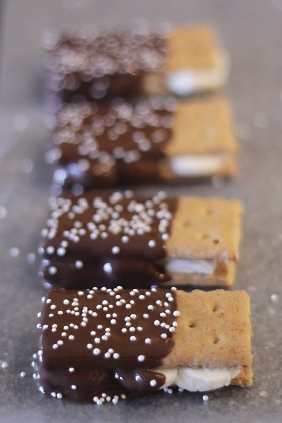 Dipped smores- graham crackers with fluff in the middle. Dipped in chocolate. Perfect for
