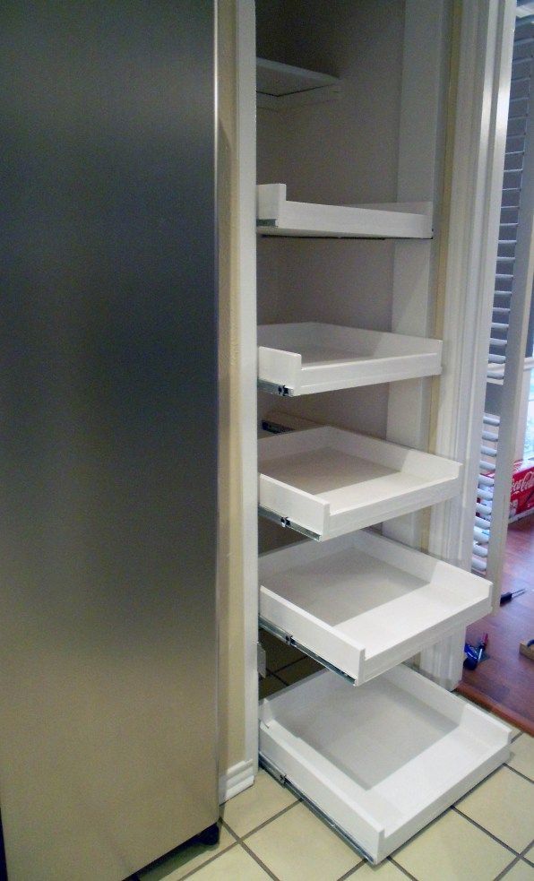How to make your own slide out shelves. Have just the spot for this!!! :) :) secret hidden cupboards are