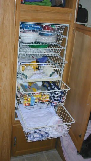 Modifications – purchase a wire drawer unit that is a perfect fit for the hanging closet even clears the shower plumbing. – Check out many more