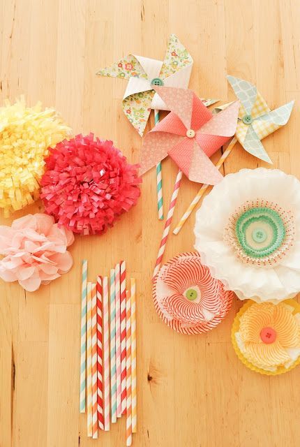 pinwheels and paper flowers-sweet “shabby chic” inspiration for a baby shower (although the party is actually a first