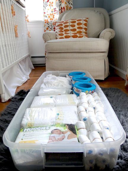 Under crib storage idea – diapers and diaper pail refills. Could also store sheets and towels and