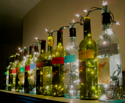 wine bottle lights. these are perfect for lining the top of the bar, instead of boring empty