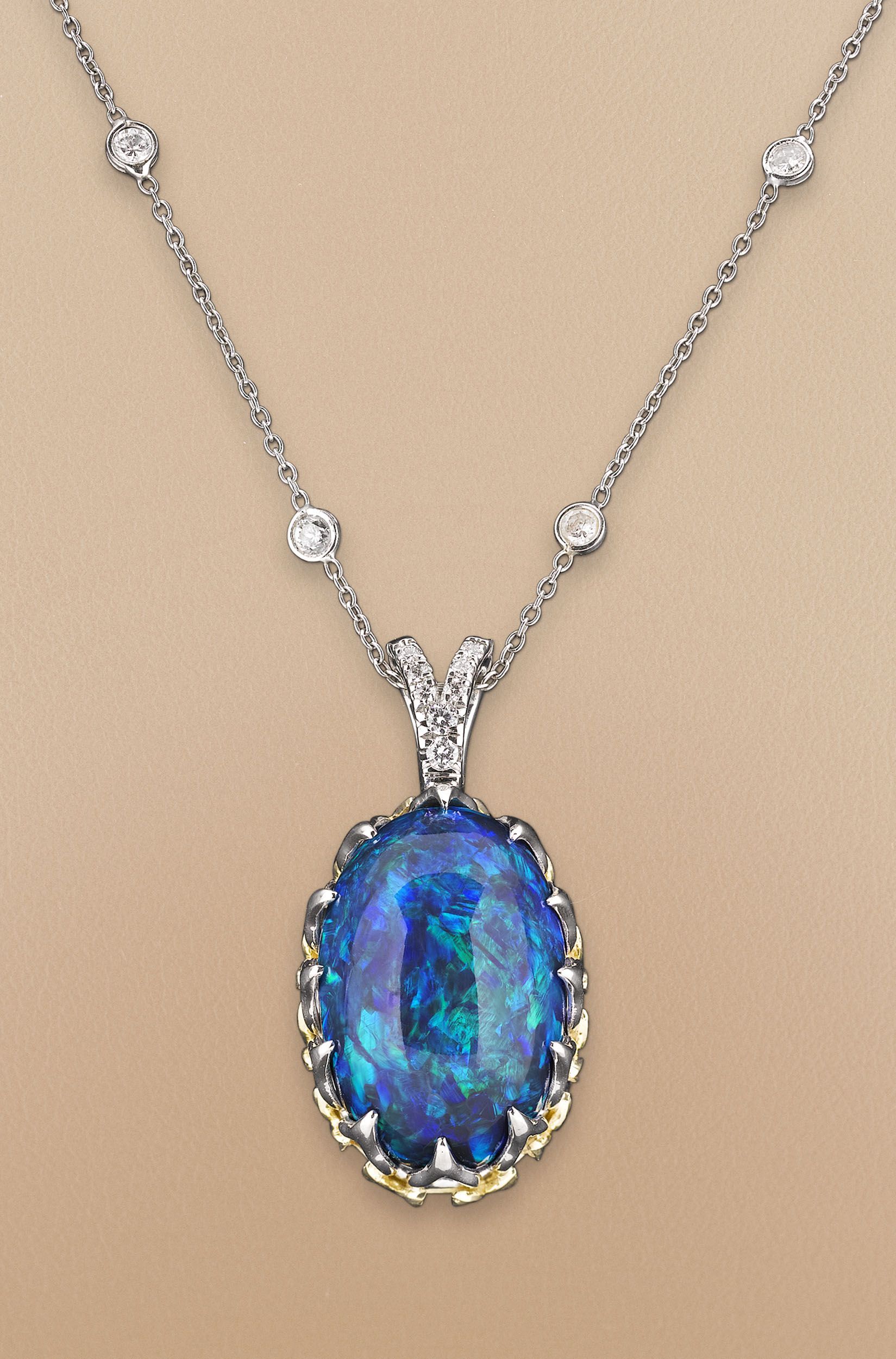 An eye-catching 20.56-carat black opal is the star of this stunning necklace ~ M.S. Rau Antiques