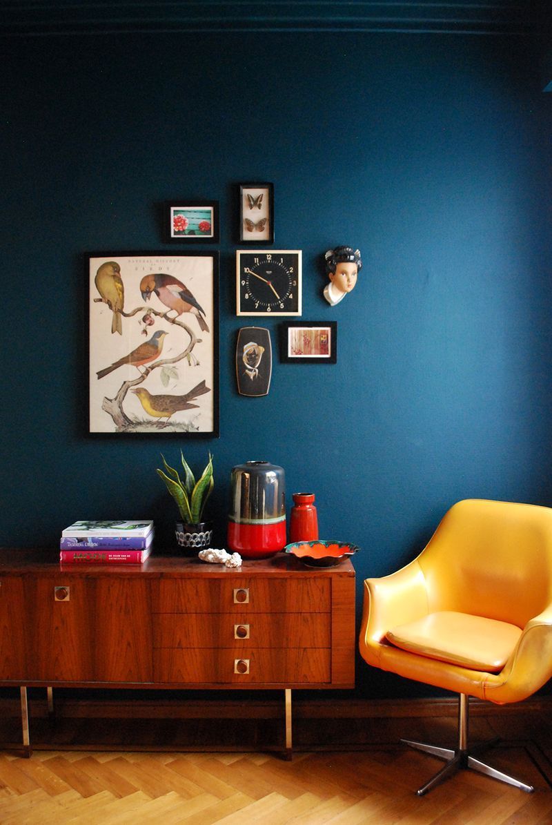 At Home With Patricia Goijens – Love the combination of dark blue and yellow chair