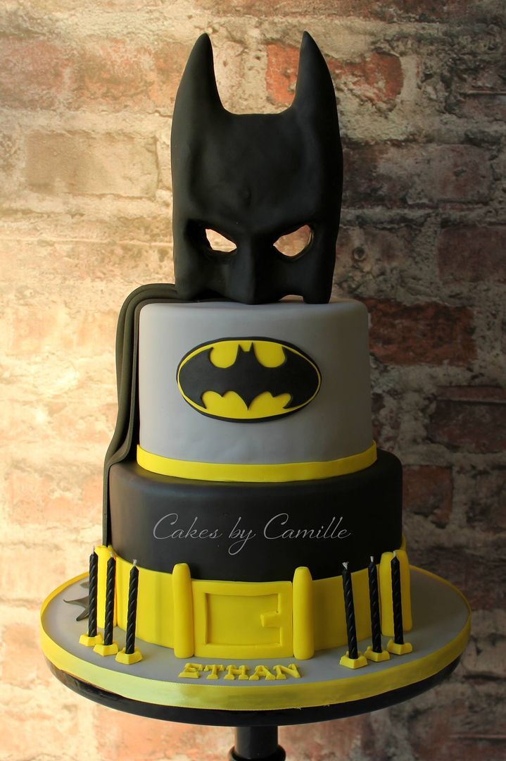 Batman birthday cake with mask, cape and belt. Perfect for any age! By Cakes by Camille.