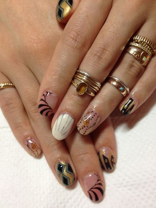 Crazy, cool nails + knuckle rings… If I could only stand to let my nails grow out.