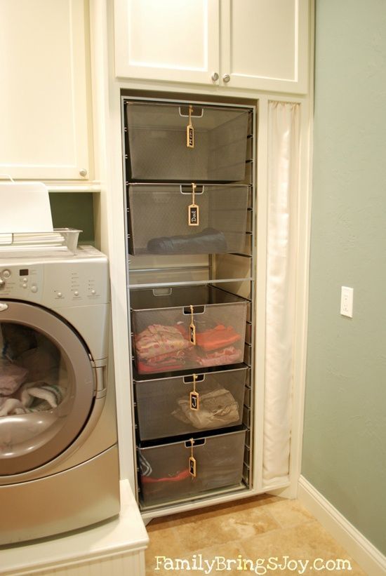 Every family member gets a basket with their clean folded laundry that can be taken to their room and put away.  Clever!