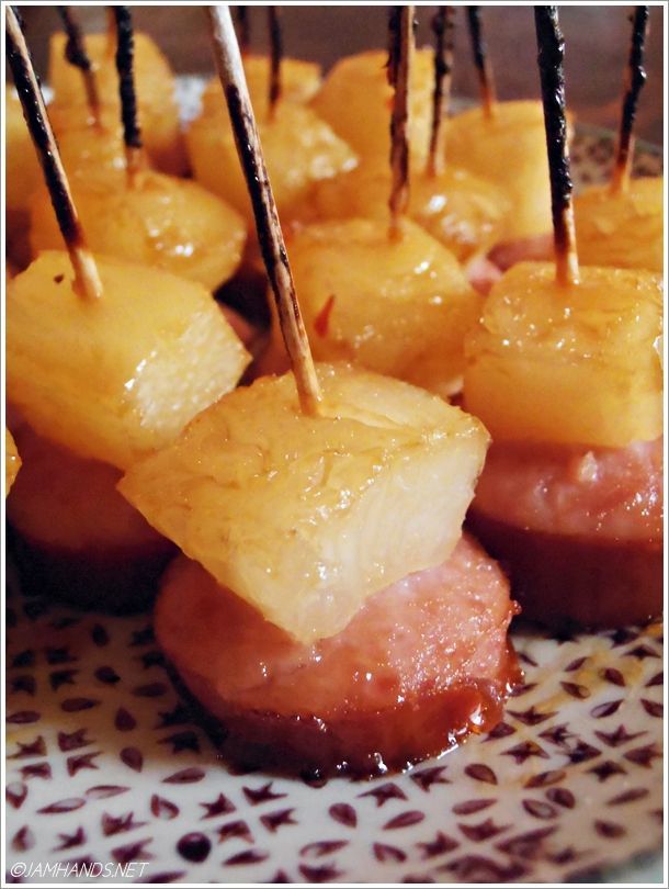 Glazed Pineapple Kielbasa Bites ~ They are incredibly quick to put together and bake. People grabbed them faster than I could