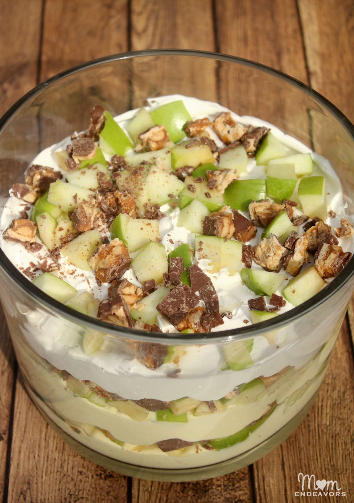 Have you ever had Apple Snickers Dessert Salad? Its sooooo good  a definite crowd favorite. And, I like to think its a slightly