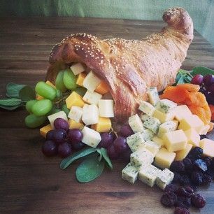 Have you made Cornucopia before?  It will become your favorite Thanksgiving table edible centerpiece.  Enjoy!