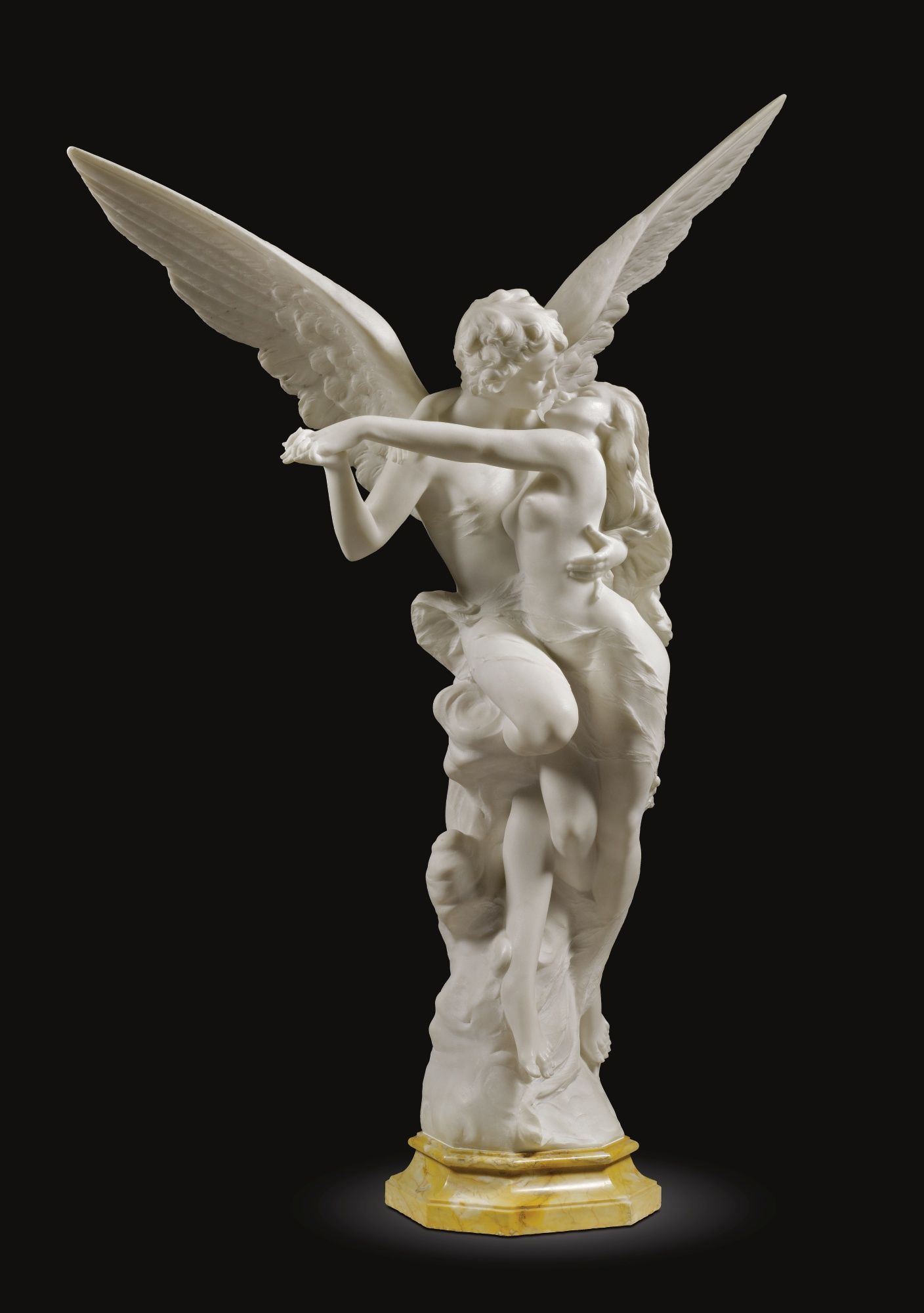Italian, circa 1900 –   CUPID AND PSYCHE –  white marble on a veined yellow marble base –  128.5cm