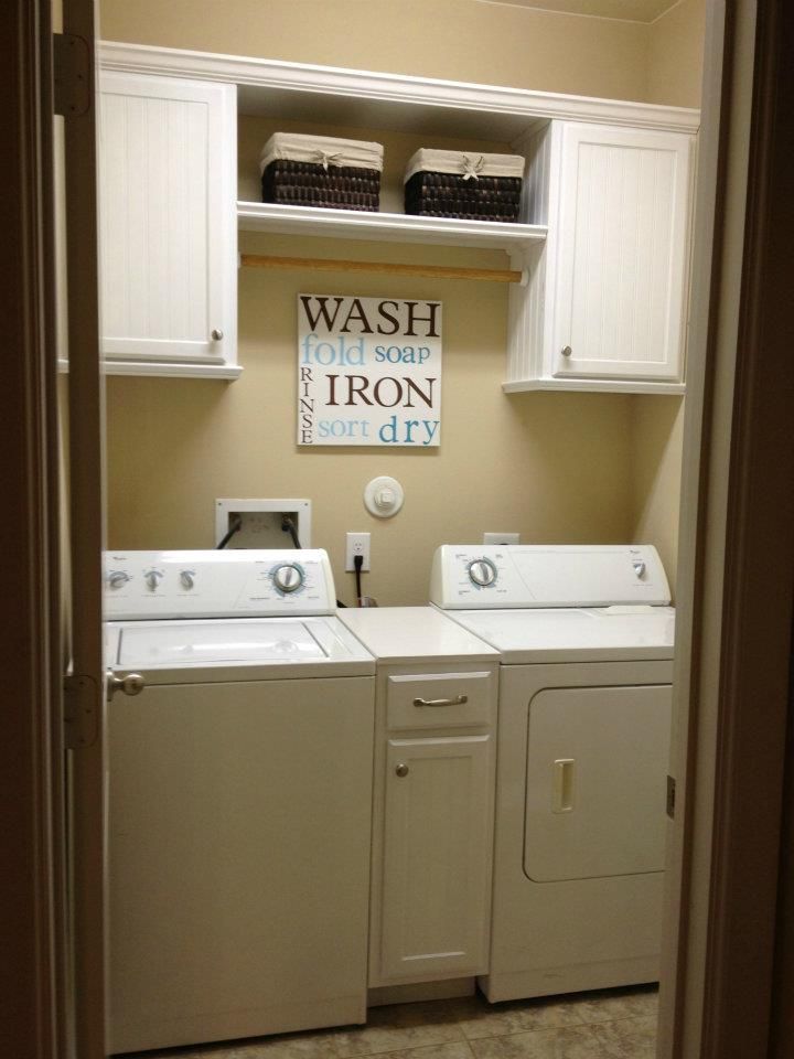 Laundry room – remove the ugly wire shelf and replace w basic white cabinets for a lovely clean look
