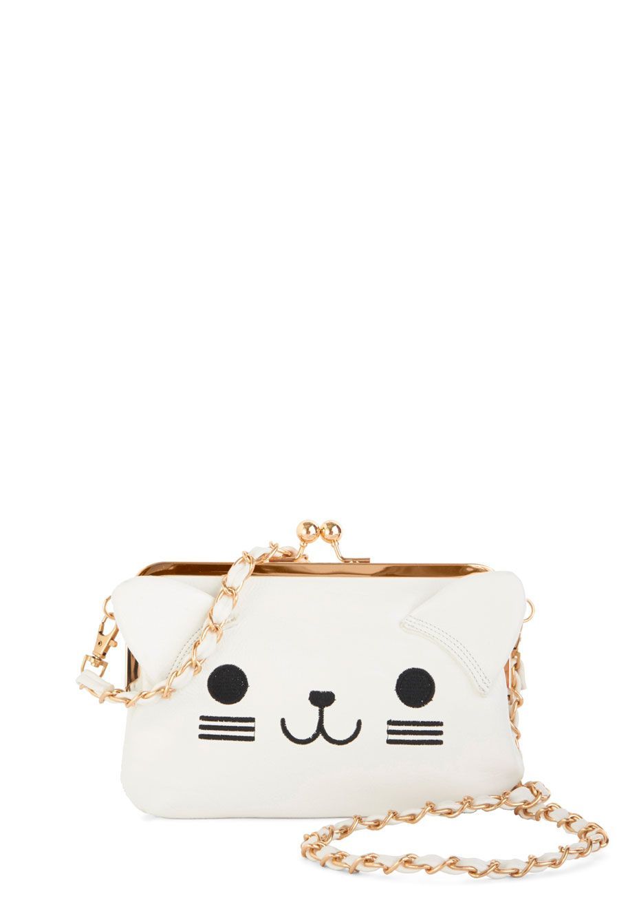Lots of Purr-sonality Bag. Though you already ooze quirky character, this vegan faux-leather cat purse by Kling impeccably